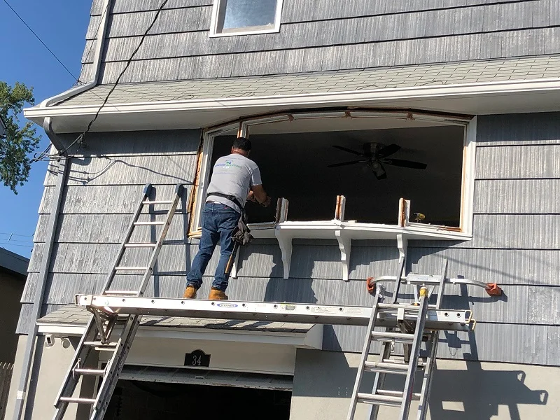 Beginning to remove this bow window in Port Chester, NY